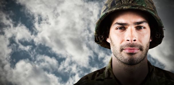 confident soldier wearing hard hat - Фото, зображення