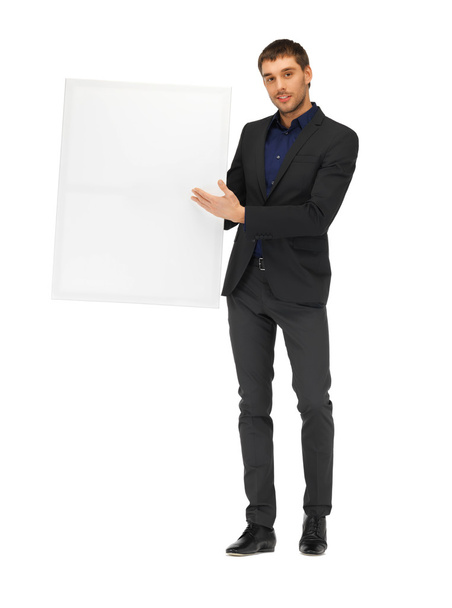 Handsome man in suit with a blank board - Foto, Imagem