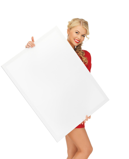 Lovely woman in red dress with blank board - Photo, Image