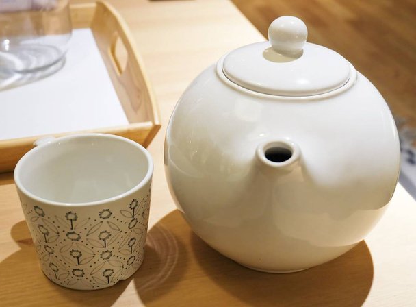 Tea Pot with Empty Cup on The Table - Photo, Image