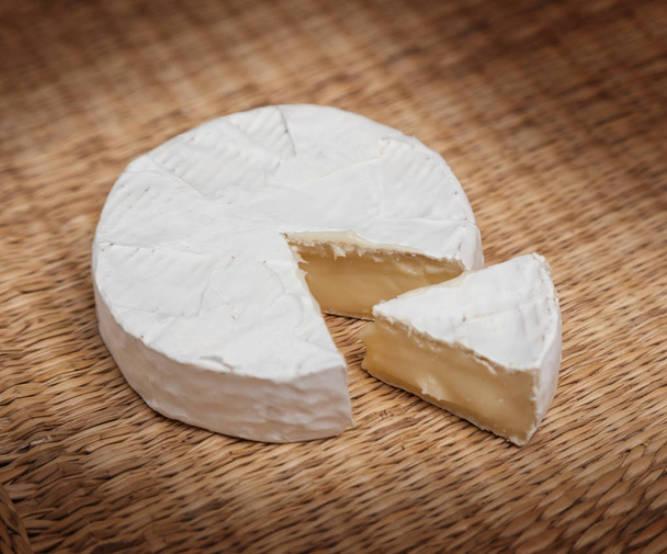 Fresh slice of Camembert cheese natural - Foto, imagen