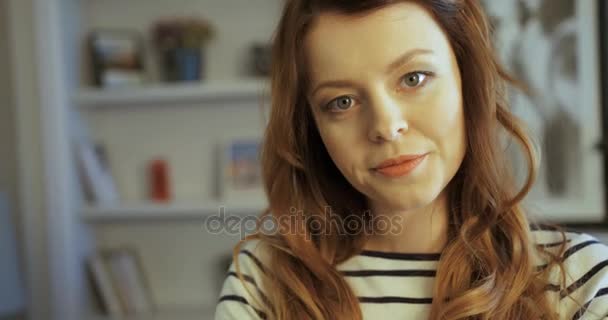 Portrait of attractive young woman with a beautiful smile. Close up. Slow motion - Footage, Video