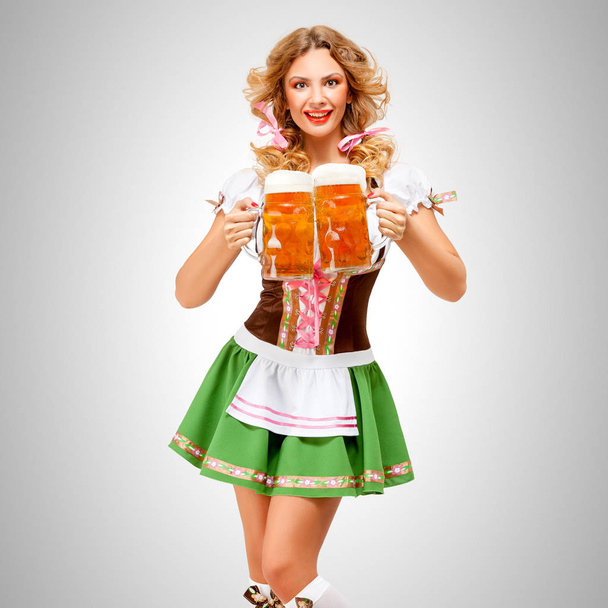 Oktoberfest woman serving beer - Fotoğraf, Görsel