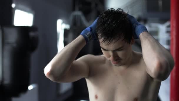 Portrait handsome man boxer after training sweat - Video, Çekim