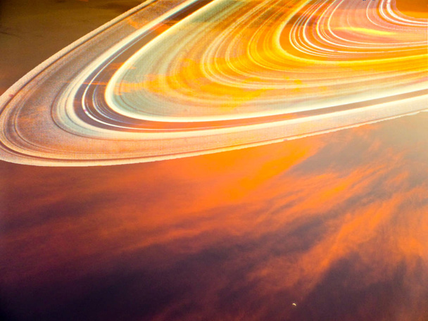saturn anel de luz sobre o céu por do sol
 - Foto, Imagem