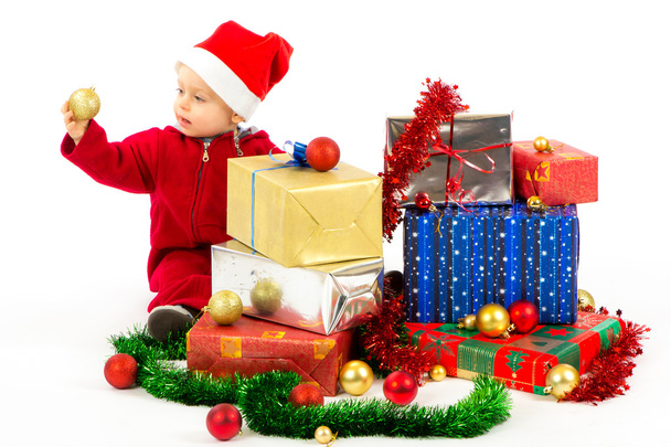 Baby with christmas gifts - Foto, immagini