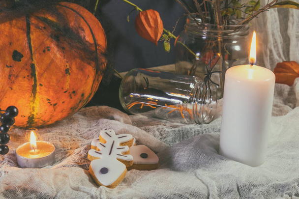 Halloween home decorations on dark background - Фото, изображение
