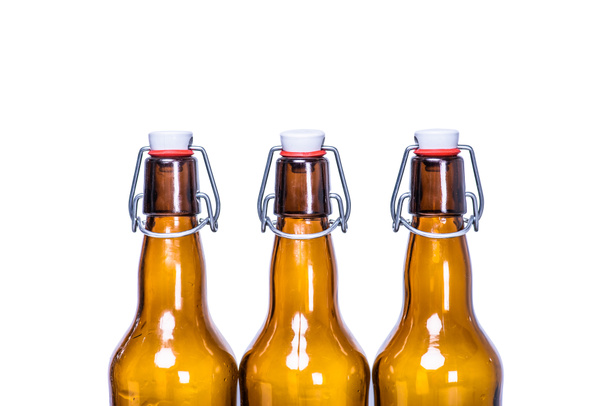 tre bottiglie di birra sigillate
 - Foto, immagini