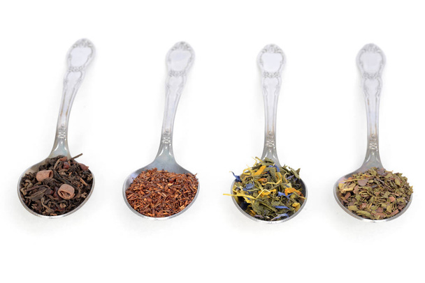 closeup organic herbal tea on spoons - Foto, Imagem