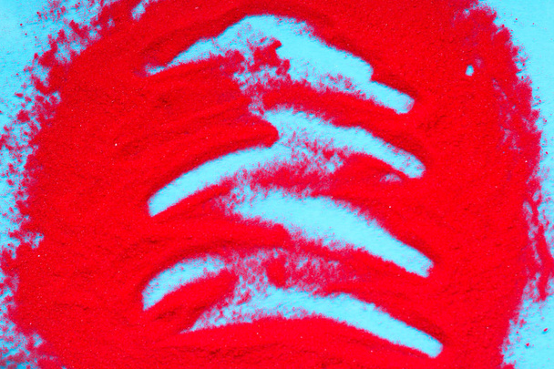 κόκκινη άμμο λεκέδες σε μπλε φόντο. - Φωτογραφία, εικόνα