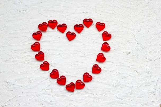 Valentines day background of red hearts confetti. Festive Valentine. - Zdjęcie, obraz