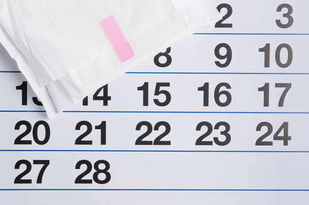 Kalendarz menstruacyjny tampony i wkładki. Czas miesiączki. Higieny i ochrony - Zdjęcie, obraz