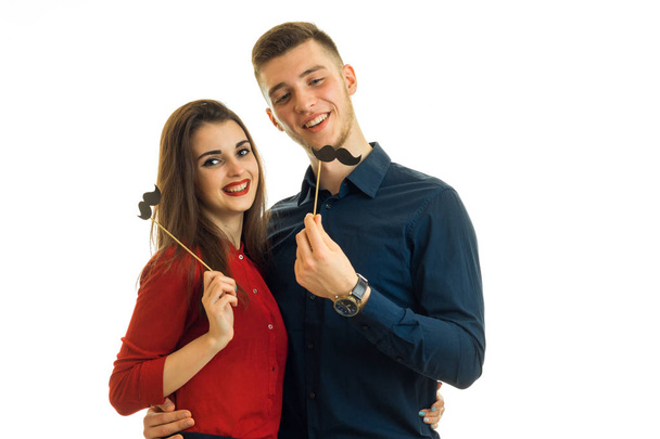 cheerful young couple having fun with a sham - Foto, Bild
