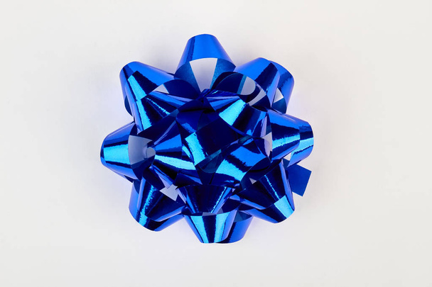 Blue bow for gift box. - 写真・画像