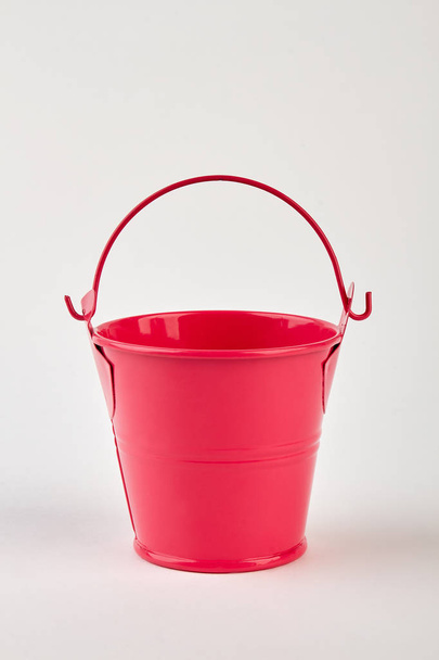 Red bucket on white background. - Photo, Image
