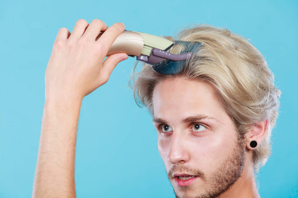 Man going to shave his long hair - Photo, Image