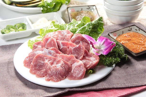 Μια φωτογραφία κουζίνα από νωπό χοιρινό κρέας - Φωτογραφία, εικόνα