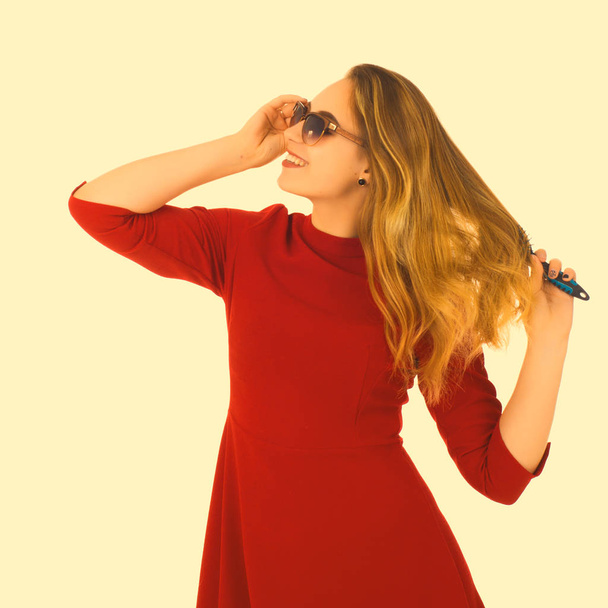 Young pretty woman, sunglasses, white background - Foto, Imagen