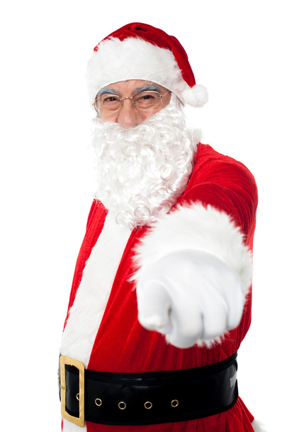 Elderly cheerful Santa pointing at you - Foto, afbeelding