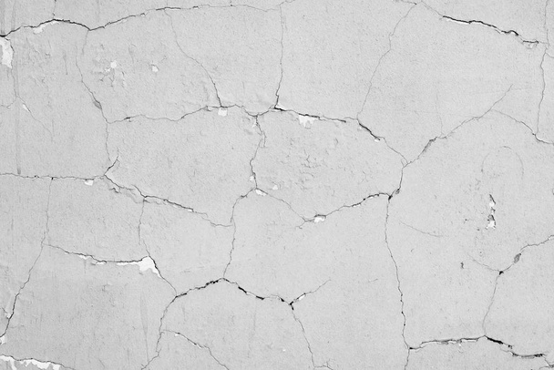 Wall fragment with scratches and cracks - 写真・画像