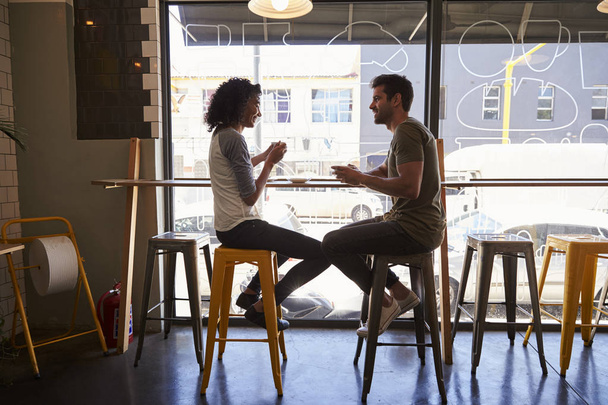 Couple Meeting In Coffee Shop - Photo, image