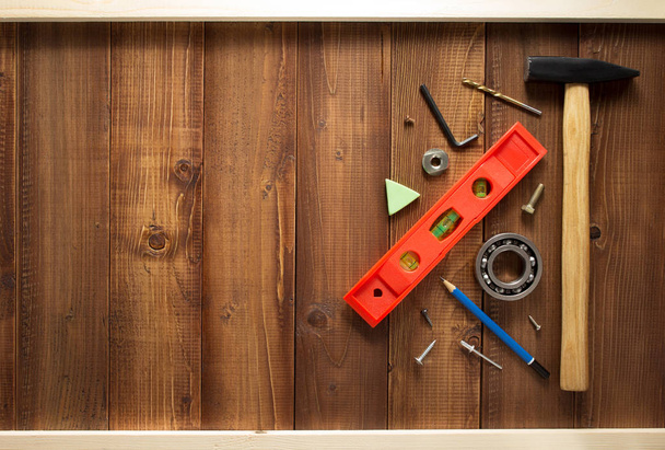 ferramentas de construção em mesa de madeira
 - Foto, Imagem