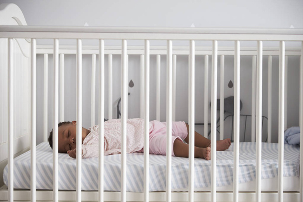 Side View Of Baby Girl Sleeping  - Фото, изображение