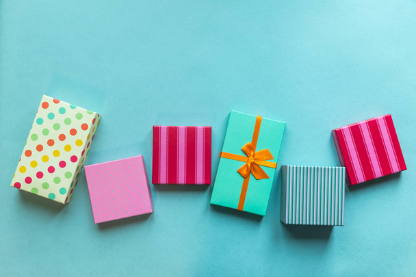 Holidays giftboxes on the pastel mint background for mother's day, christmas, birthday - 写真・画像