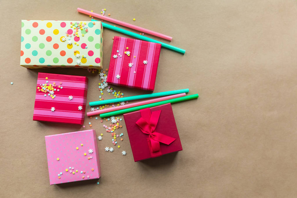 Holidays giftboxes on the craft paper background for mother's day, christmas, birthday - 写真・画像