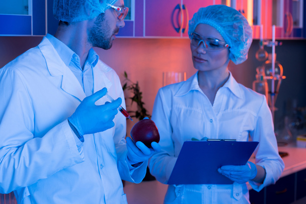 Scientists during work at laboratory  - Foto, Bild