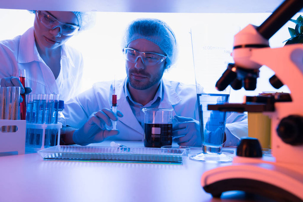 Scientists during work at laboratory  - Fotoğraf, Görsel