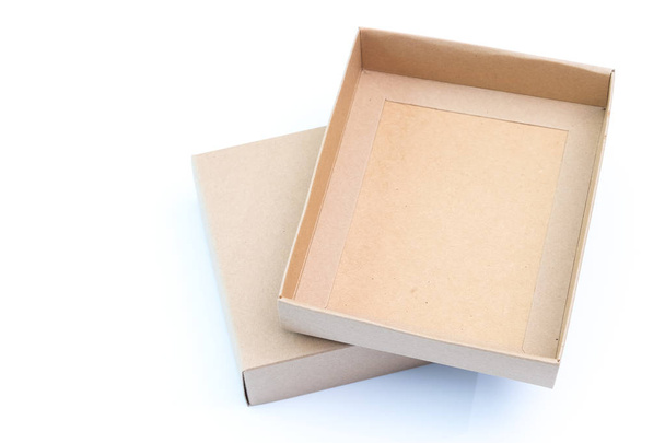 Empty craft paper cardboard box isolated on a white - Fotó, kép