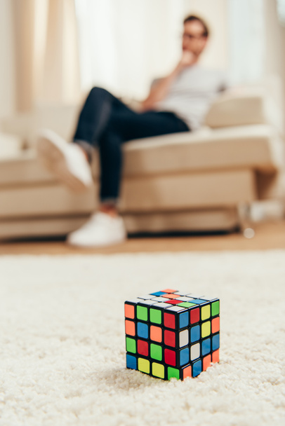 Rubik cube on carpet  - Фото, изображение