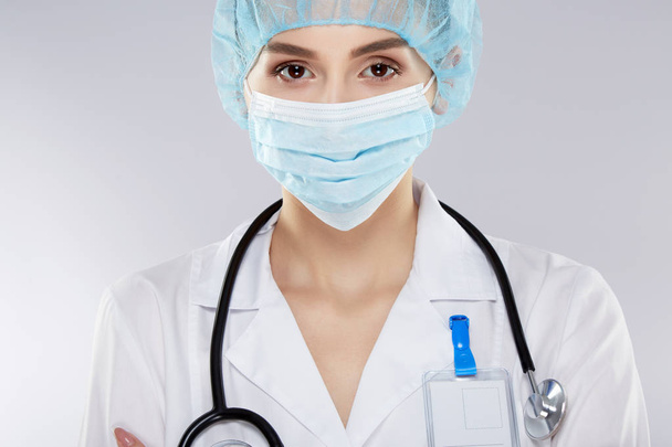 female doctor wearing medical hat - Photo, image