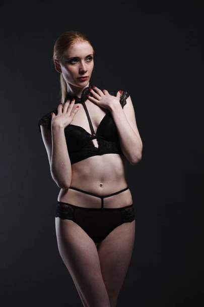 Sexy girl in underwear posing in studio - Фото, изображение