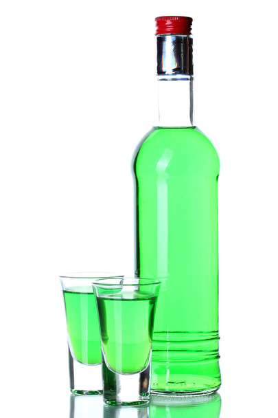 bottle and two glasses of absinthe isolated on white - Foto, Imagem