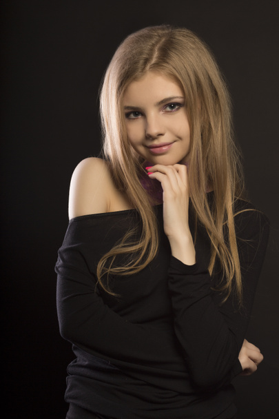 Smiling  blonde woman with  perfect makeup posing at studio - Fotografie, Obrázek