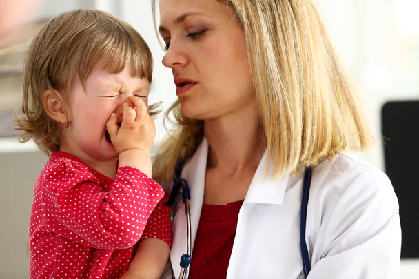 Little scared child at doctor reception - Photo, Image