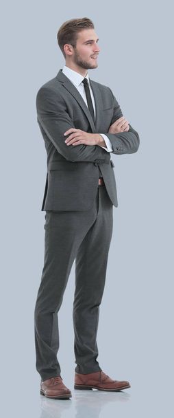 Portrait of a elegant handsome business man on gray background. - Фото, изображение