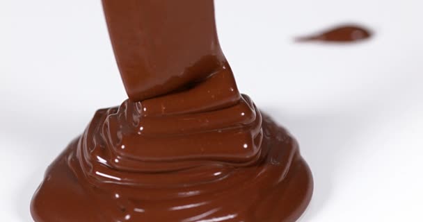 Chocolate Flowing on White - Footage, Video