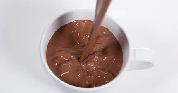 Chocolate Pouring into a Bowl - Video, Çekim