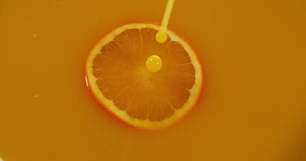 Orange Juice being poured - Materiał filmowy, wideo