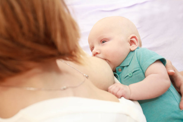 mother breast feeding - Photo, Image