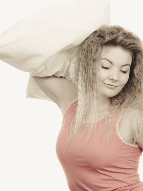 Sleepy woman hugging white pillow - Foto, immagini
