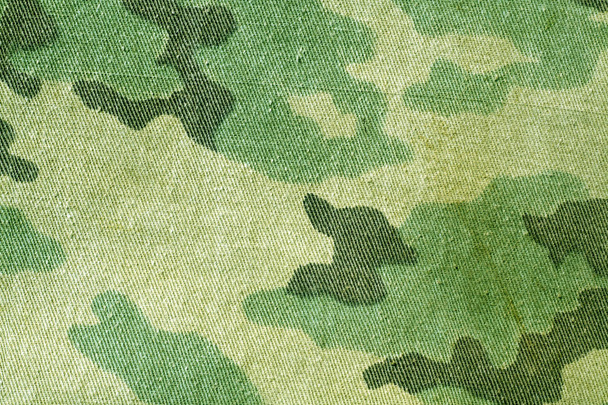 Dirty old camouflage uniform pattern.  - Photo, Image