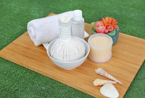 Spa herbal compressing ball with towels and Salt Scrub, Spa concept background - Photo, Image