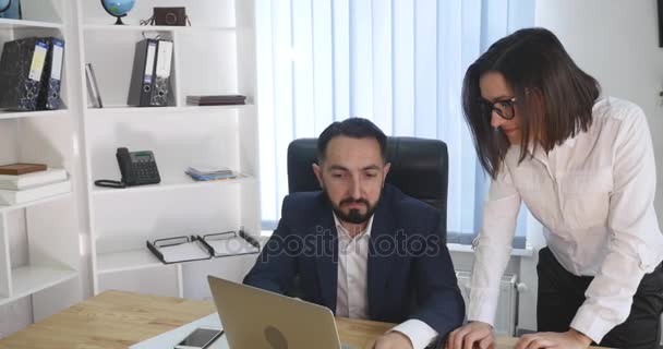 Image of two successful business partners working at meeting in office - Πλάνα, βίντεο