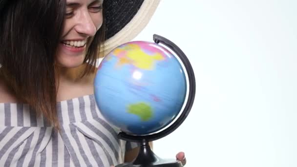 Female explorer with the globe in her hands - isolated - Footage, Video