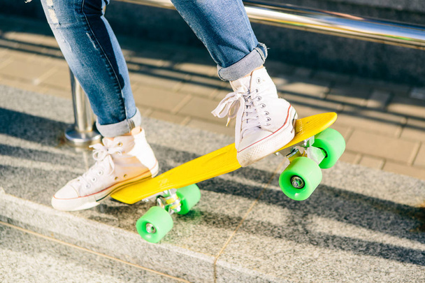 Girl with penny skateboard shortboard. - Φωτογραφία, εικόνα