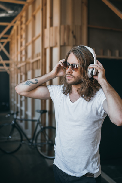 Young man in headphones  - Photo, Image